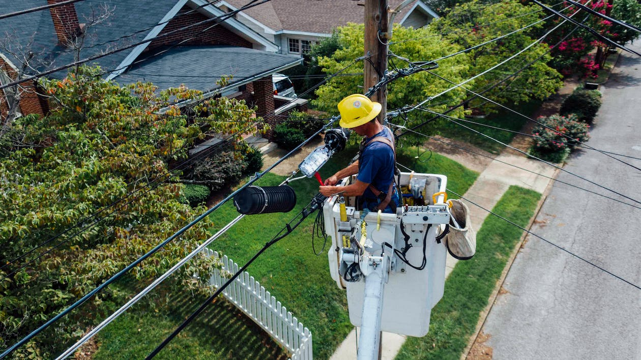 Electrician conducts repair work on wires.